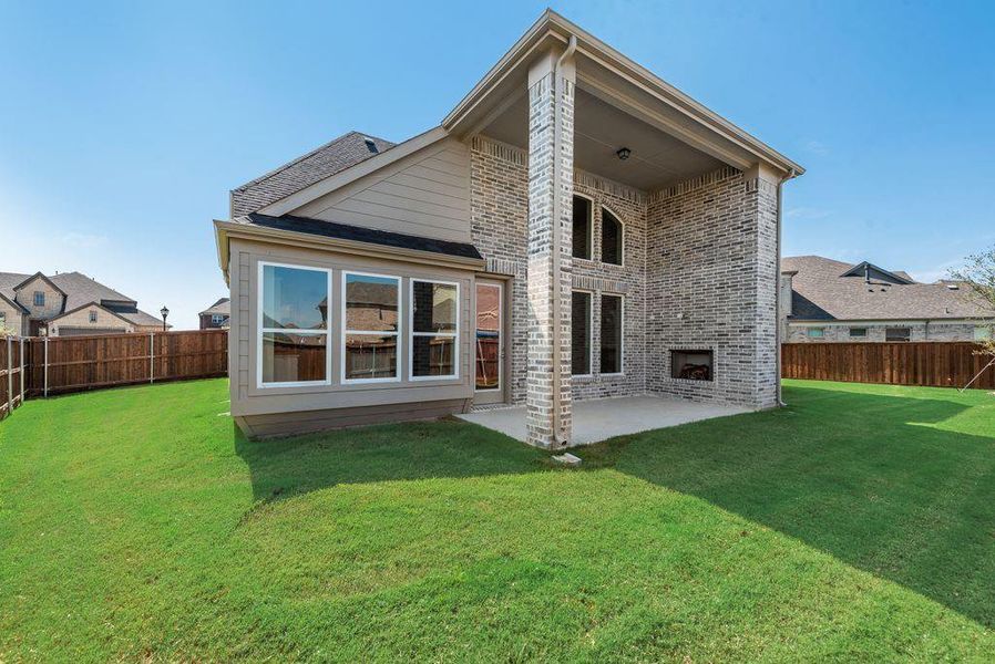 Exterior details and patio area of a home in South Pointe, Mansfield (Image 16).