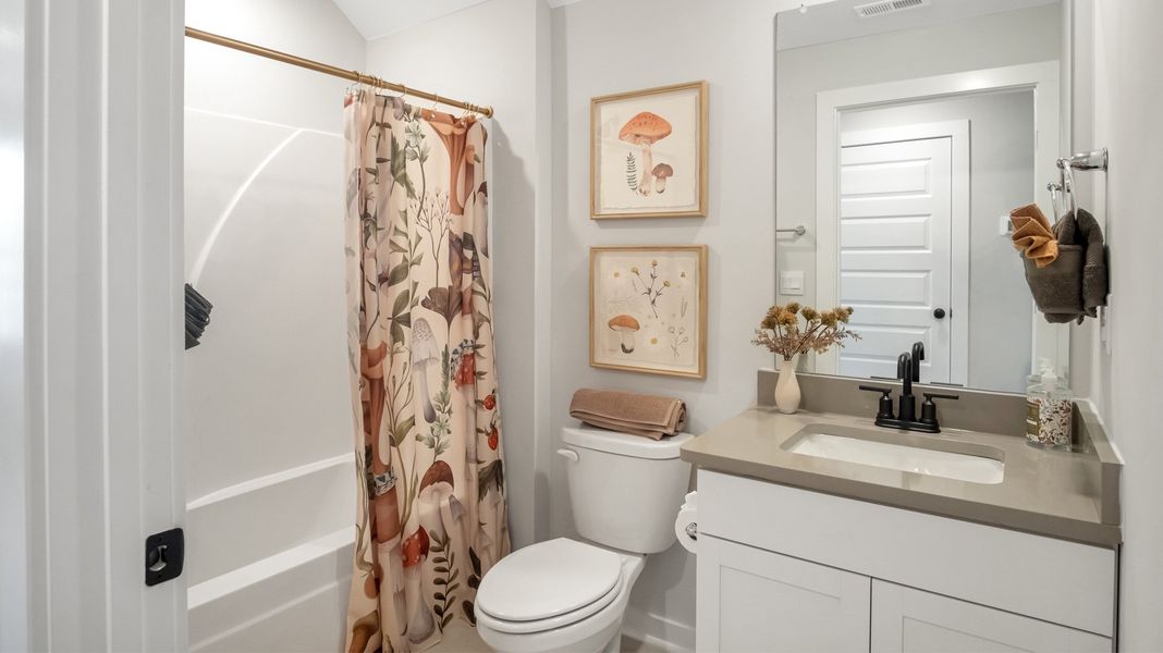 Representative furnished interior of a home built from the CLIFTON by D.R. Horton in Shiloh Springs, Jackson (Image 25).