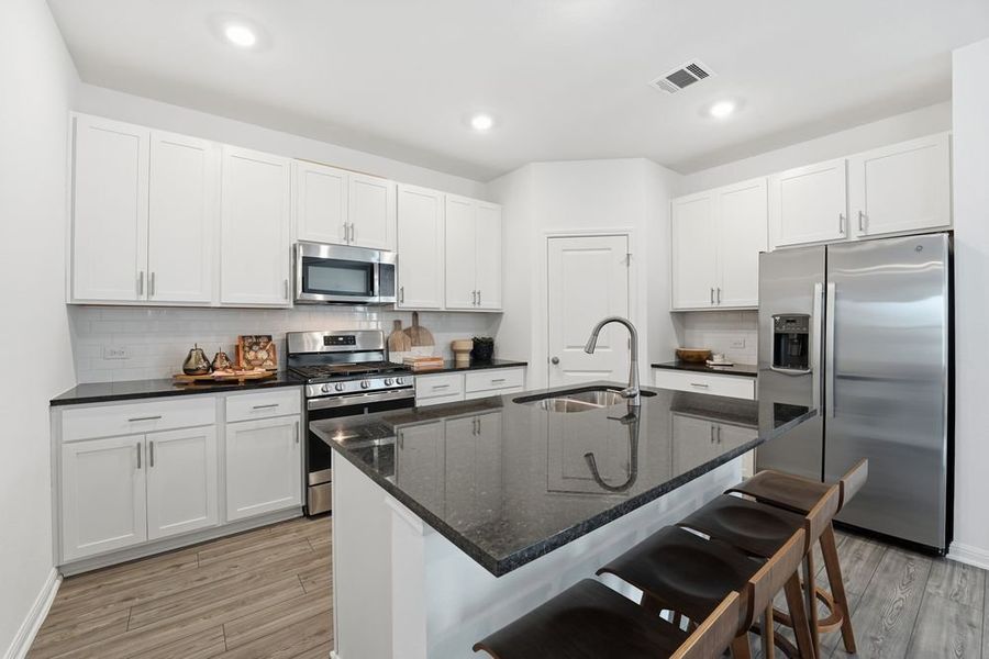 Furnished interior view inside a new home in Longview, Del Valle (Image 7).