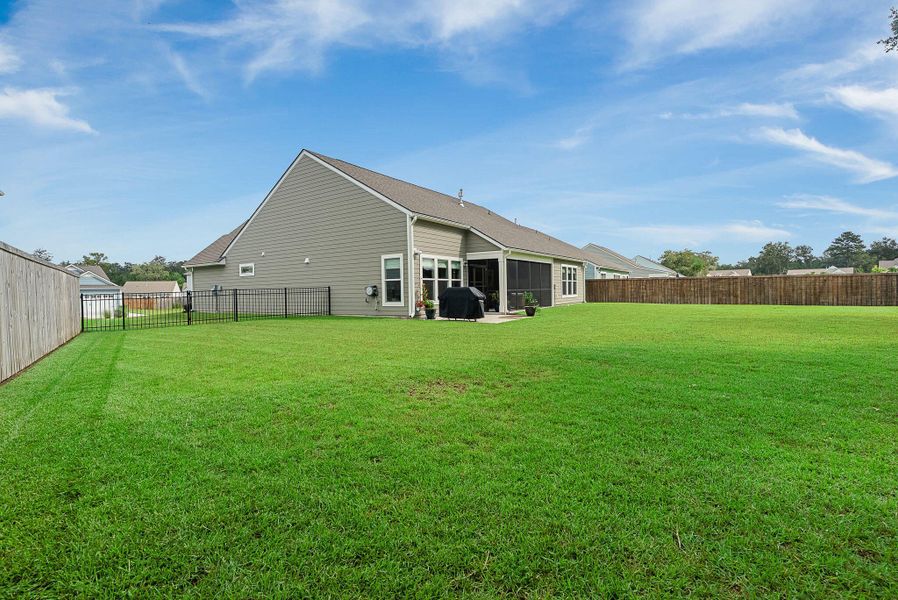 Exterior details and patio area of a home in Sea Island Preserve, Johns Island (Image 36).