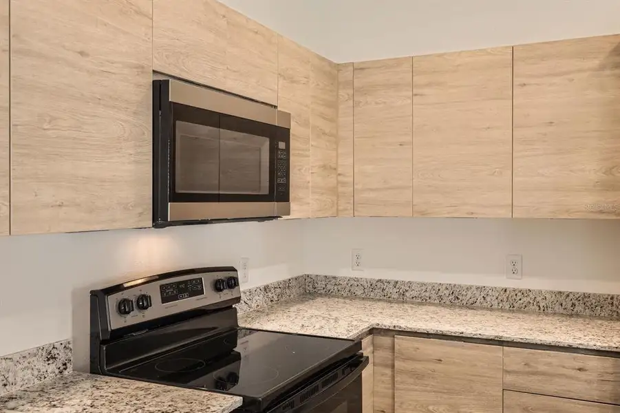 Furnished interior view inside a new home in , Orlando (Image 3).