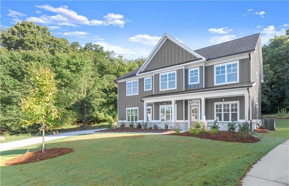 Front exterior of a new home in , Covington, GA, highlighting curb appeal (Image 20).