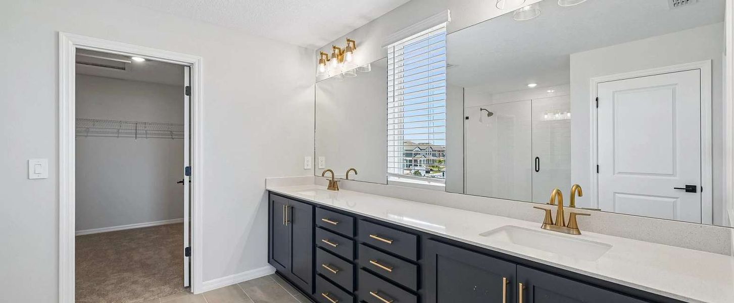 Primary bathroom with double sinks and plenty of cabinets will feature AW Collection® Serene - Representative images and renderings are for illustrative purposes Primary bathroom with double sinks and plenty of cabinets will feature AW Collection® Serene - Representative images and renderings are for illustrative purposes