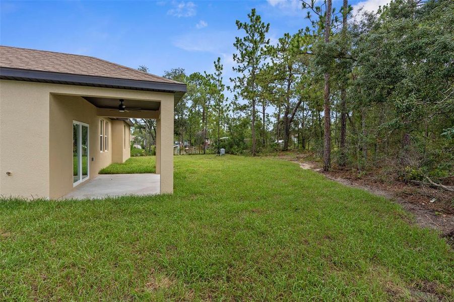 Front exterior of a new home in , Weeki Wachee, FL, highlighting curb appeal (Image 23). Front exterior of a new home in , Weeki Wachee, FL, highlighting curb appeal (Image 23).