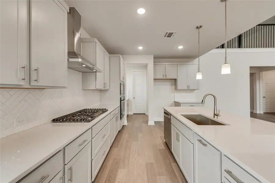 Furnished interior view inside a new home in Sutton Fields, Celina (Image 6).