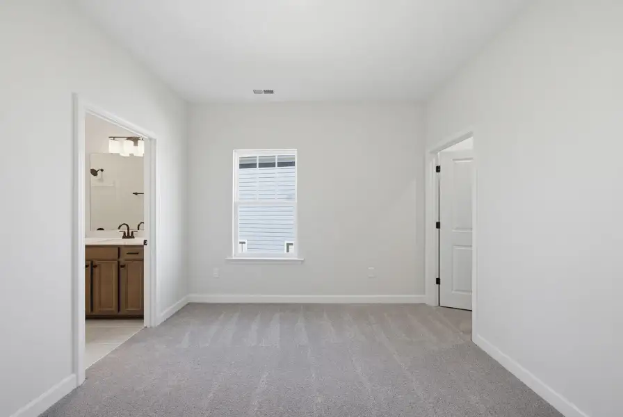 Spacious, unfurnished interior of a new home in Sweetbrier, Durham (Image 33).