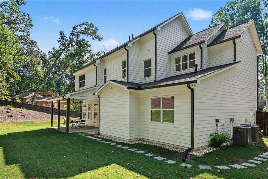Front exterior of a new home in , Smyrna, GA, highlighting curb appeal (Image 26).