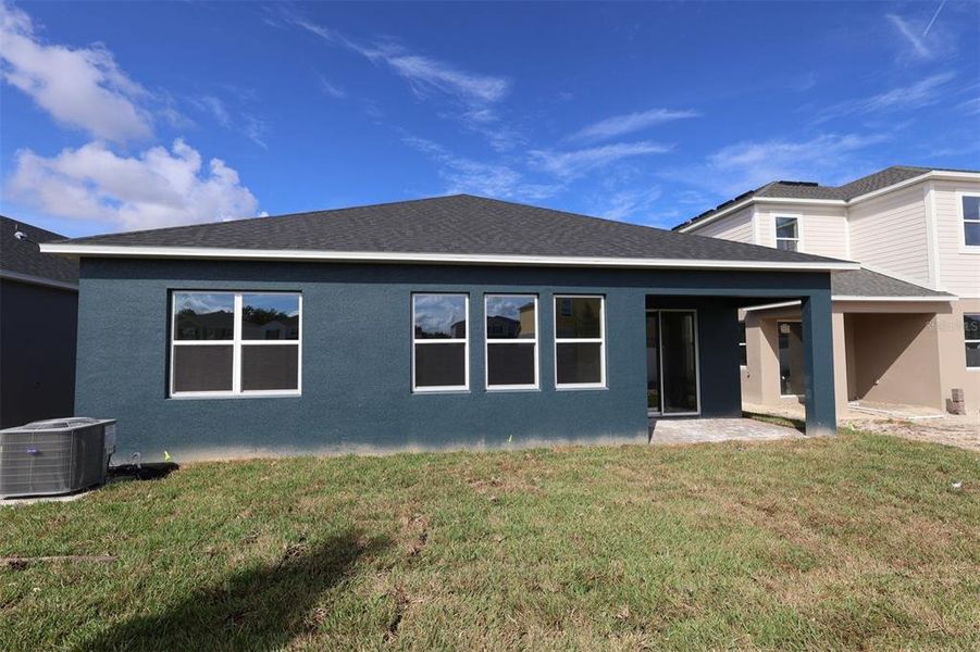 Exterior details and patio area of a home in Estates at Rivercrest, Sanford (Image 3).