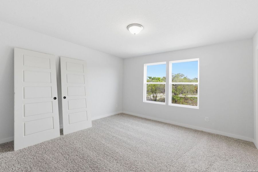 Spacious, unfurnished interior of a new home in The Meadows at Hunters Ranch, San Antonio (Image 34).