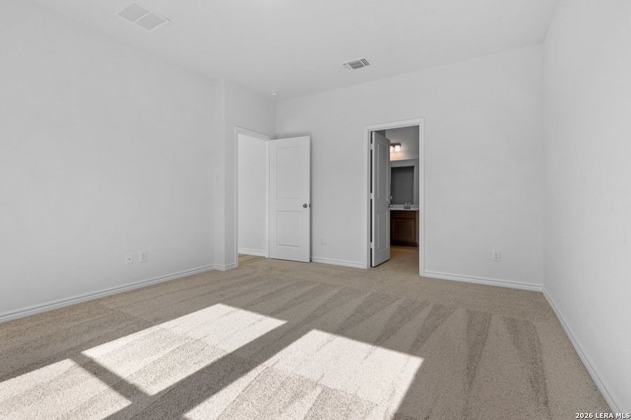 Spacious, unfurnished interior of a new home in Hidden Bluffs at TRP, San Antonio (Image 17).