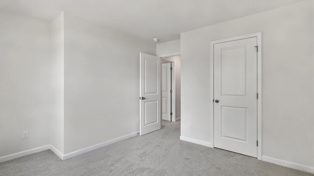 Spacious, unfurnished interior of a new home in The Gables at Edinborough Townes, Gibsonville (Image 20).