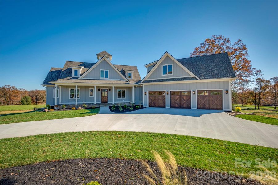 Front exterior of a new home in , Tryon, NC, highlighting curb appeal (Image 24).