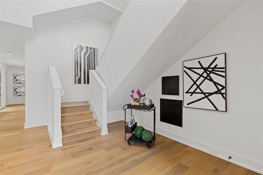 Stair to 2nd level. Beyond the stair is an office, to the left is the 1 bedroom apartment suite.