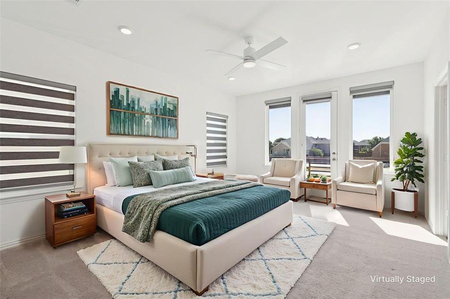 Primary bedroom with carpet floors, access to outside balcony, a ceiling fan, and recessed lighting Primary bedroom with carpet floors, access to outside balcony, a ceiling fan, and recessed lighting