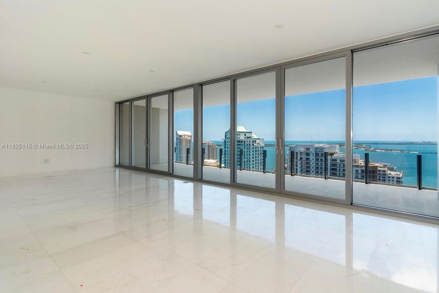 Spacious, unfurnished interior of a new home in Aston Martin Residences, Miami (Image 28).