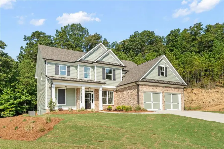 Front exterior of a new home in , Dallas, GA, highlighting curb appeal (Image 2). Front exterior of a new home in , Dallas, GA, highlighting curb appeal (Image 2).