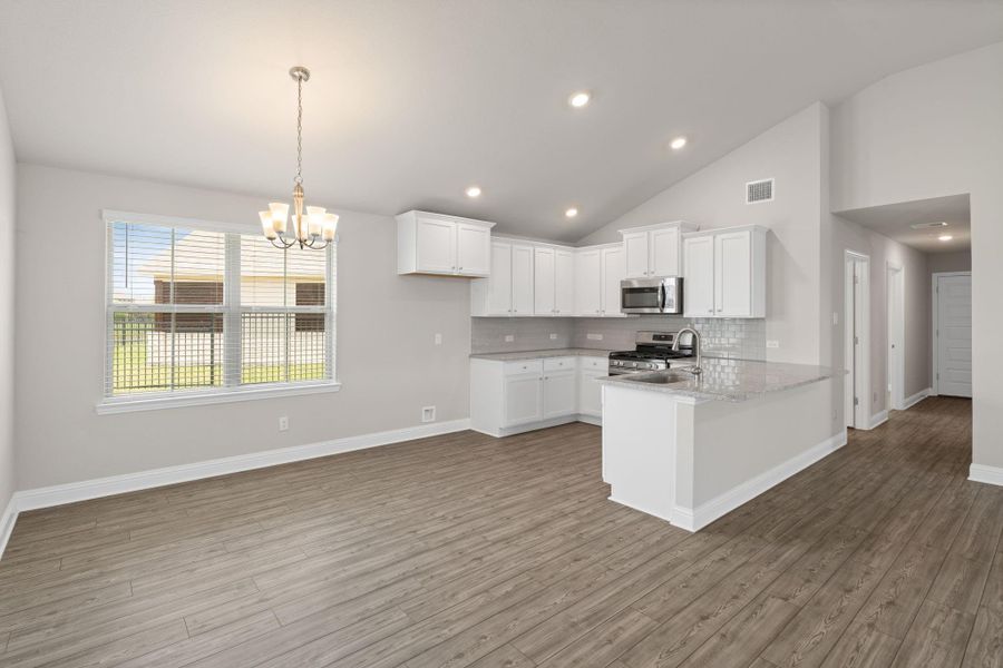 Furnished interior view inside a new home in Sunterra, Katy (Image 5).