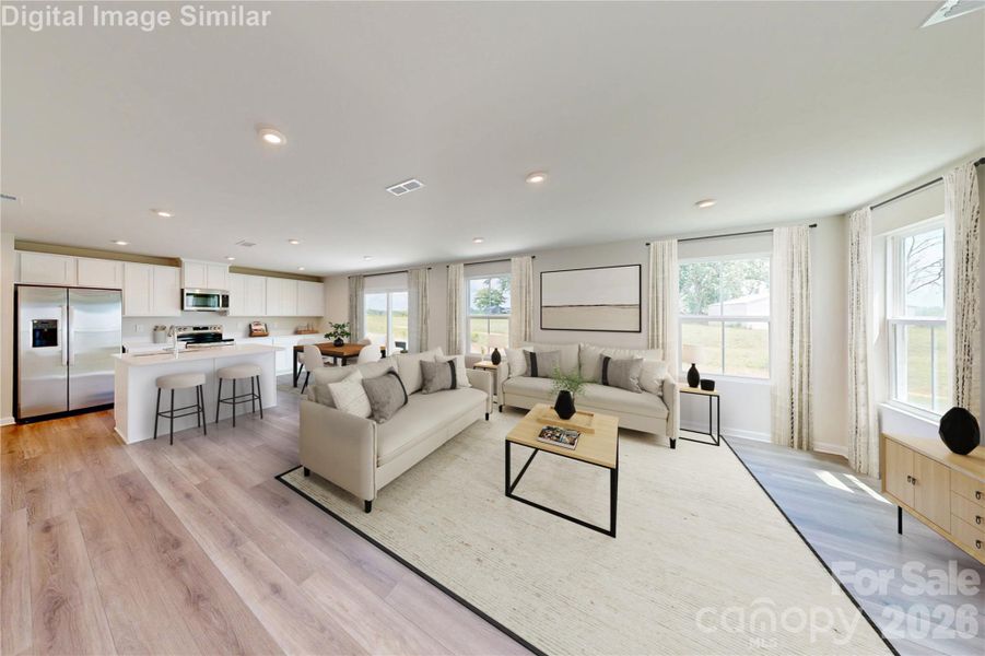 Wide open spaces, sunshine galore! This kitchen and great room combo is bursting with light, style, and room to live your best life!