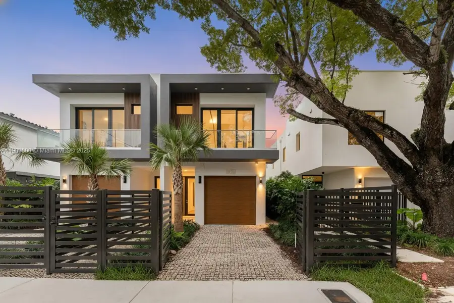 Front exterior of a new home in , Miami, FL, highlighting curb appeal (Image 1). Front exterior of a new home in , Miami, FL, highlighting curb appeal (Image 1).