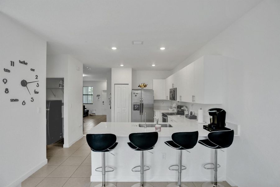 Furnished interior view inside a new home in , Miami (Image 15). Furnished interior view inside a new home in , Miami (Image 15).