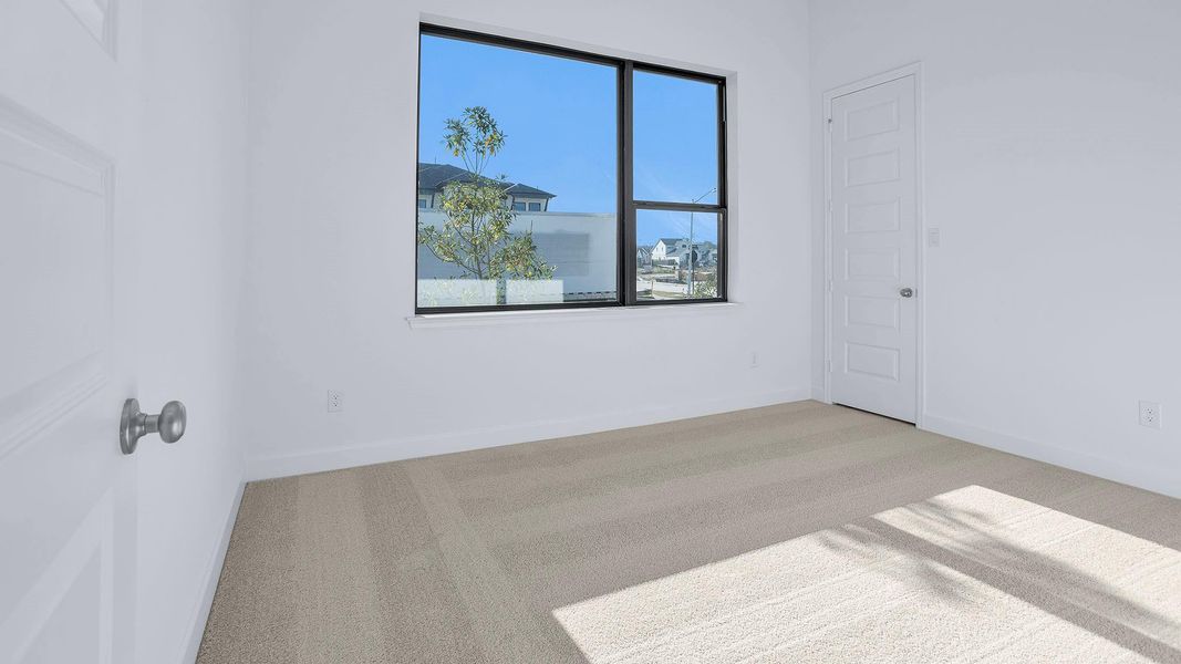 Spacious, unfurnished interior of a new home in Artavia 55' - Valencia, Conroe (Image 14).