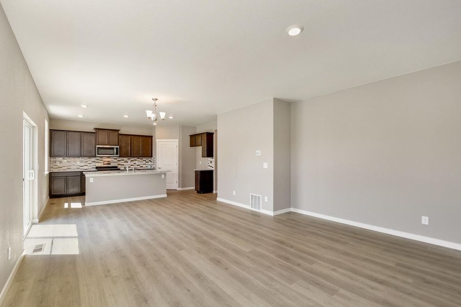 Representative unfurnished interior of a home built from the Holcombe by D.R. Horton in Brighton Crossing, Brighton (Image 14).