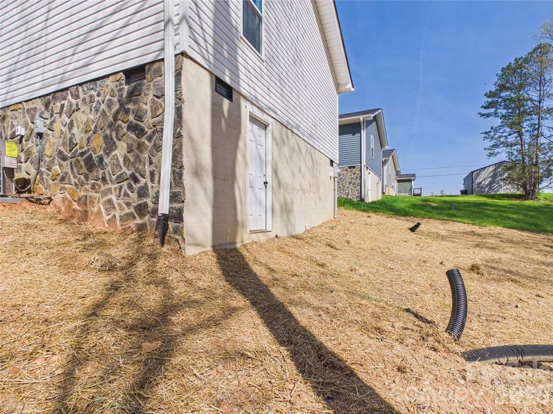 Exterior details and patio area of a home in , Valdese (Image 17).