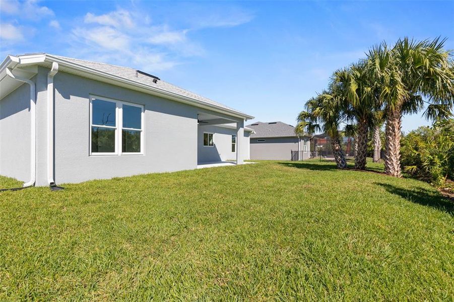 Exterior details and patio area of a home in , Palm Coast (Image 23).