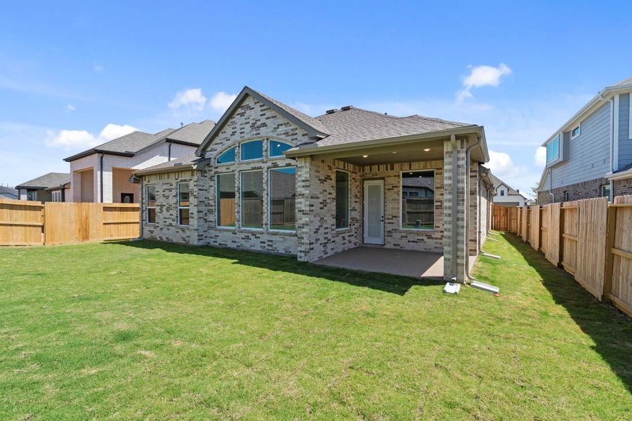 Exterior details and patio area of a home in Jordan Ranch 40's, Fulshear (Image 3).