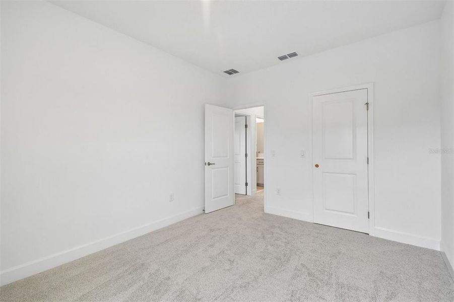 Spacious, unfurnished interior of a new home in Oakfield at Mount Dora Village Series, Mount Dora (Image 22).
