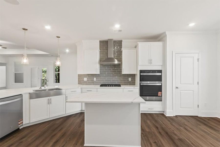 Rich hardwood floors contrast beautifully with cle