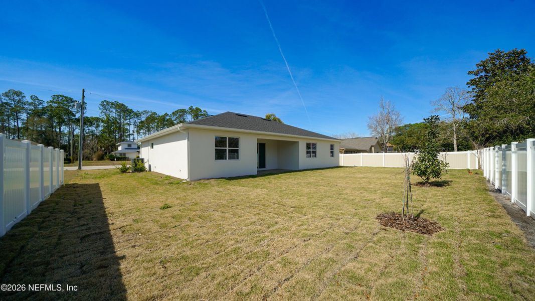 Exterior details and patio area of a home in , Palm Coast (Image 4).