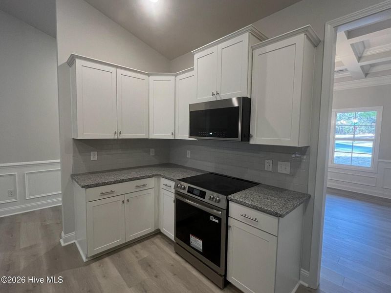 Furnished interior view inside a new home in Palmetto Creek, Bolivia (Image 6).