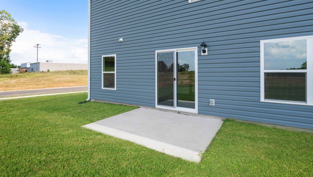 Front exterior of a new home in Cedar Gap, Fountain Inn, SC, highlighting curb appeal (Image 20). Front exterior of a new home in Cedar Gap, Fountain Inn, SC, highlighting curb appeal (Image 20).