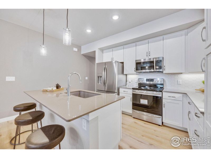 Furnished interior view inside a new home in Northfield at Old Town - Vista Collection, Fort Collins (Image 15).