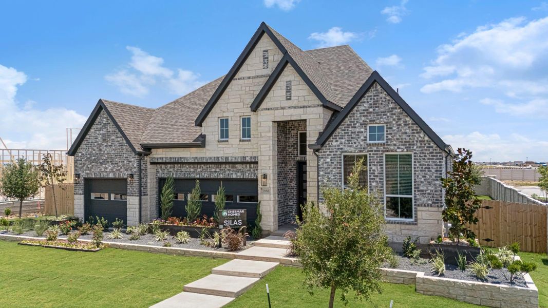 Front exterior of a new home in The Grove at Blackhawk, Pflugerville, TX, highlighting curb appeal (Image 30). Front exterior of a new home in The Grove at Blackhawk, Pflugerville, TX, highlighting curb appeal (Image 30).