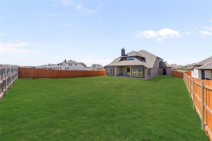 Exterior details and patio area of a home in Sunrise at Garden Valley, Waxahachie (Image 27). Exterior details and patio area of a home in Sunrise at Garden Valley, Waxahachie (Image 27).