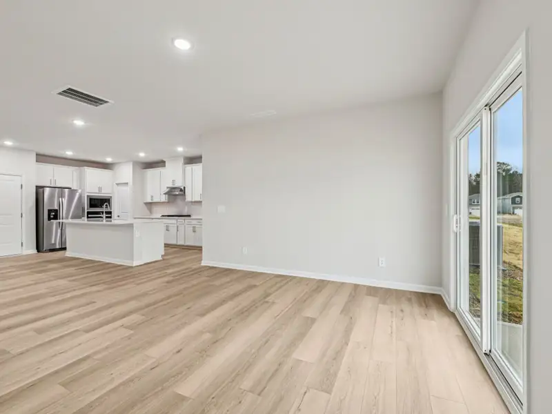 Spacious, unfurnished interior of a new home in Oak Manor - Classic Series, Garner (Image 8). Spacious, unfurnished interior of a new home in Oak Manor - Classic Series, Garner (Image 8).