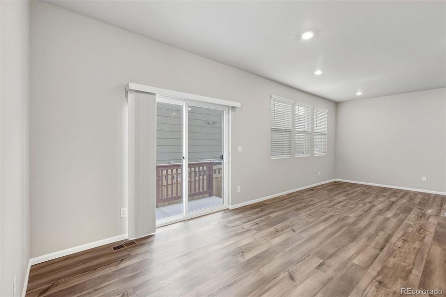 Spacious, unfurnished interior of a new home in Woodrose at Painted Prairie, Aurora (Image 13).