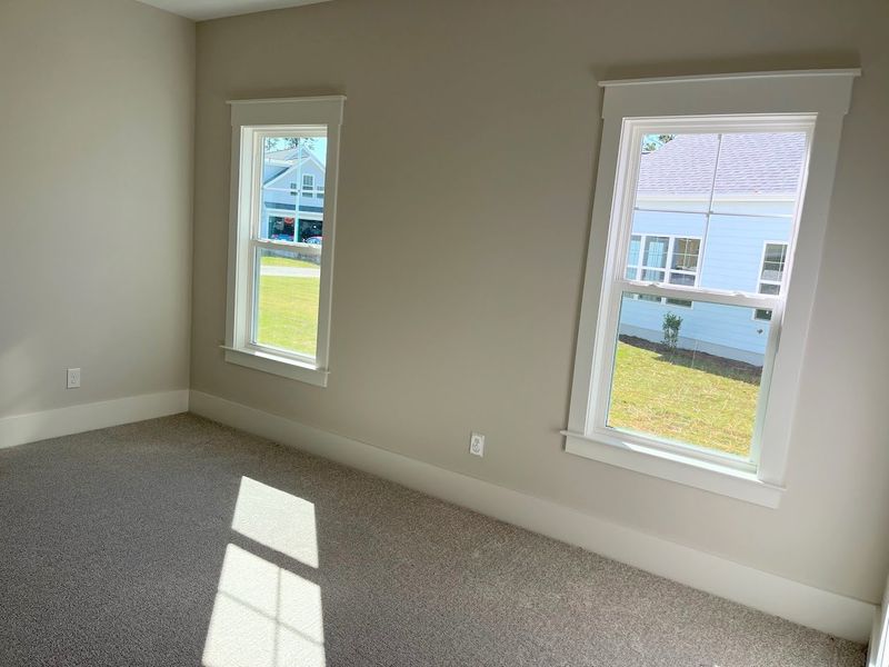 Spacious, unfurnished interior of a new home in Osprey Landing, Southport (Image 16).