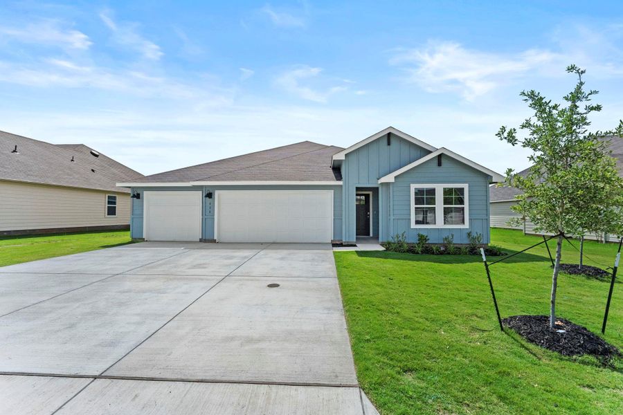 Front exterior of a new home in Sonoma Oaks, Fredericksburg, TX, highlighting curb appeal (Image 1). Front exterior of a new home in Sonoma Oaks, Fredericksburg, TX, highlighting curb appeal (Image 1).