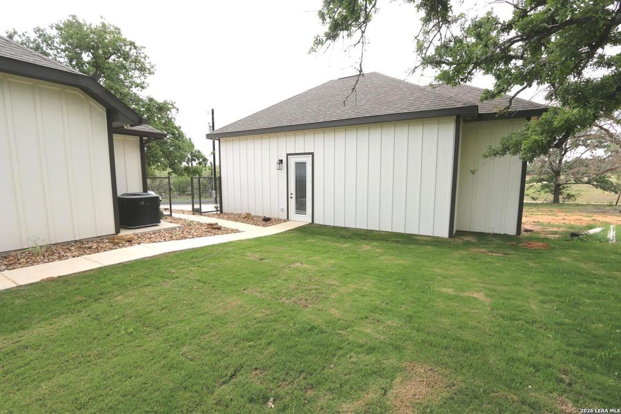 Exterior details and patio area of a home in , La Vernia (Image 48).
