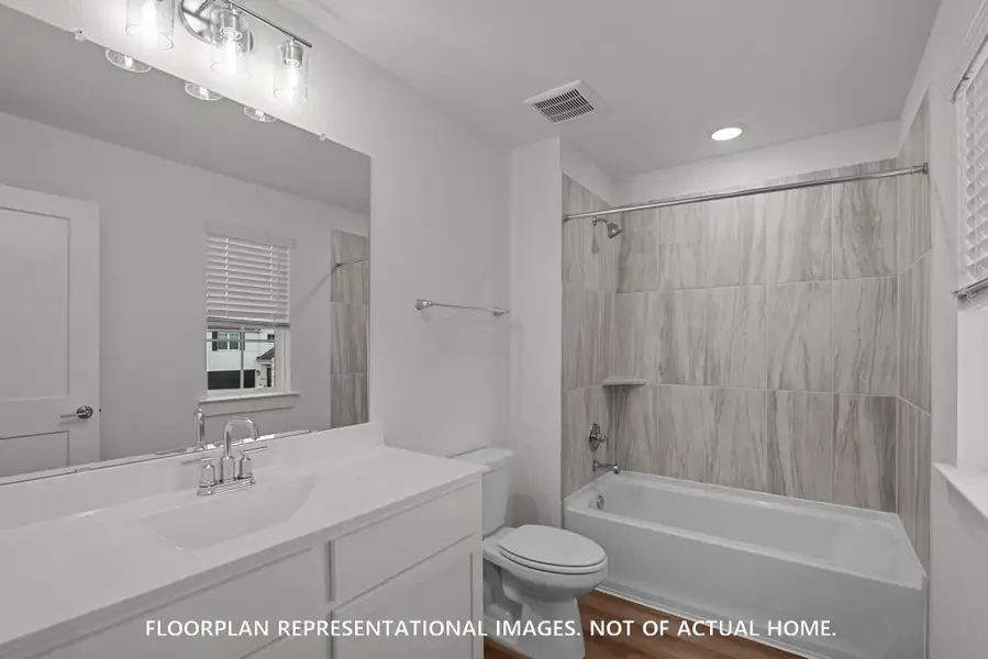 Furnished interior view inside a new home in The Oaks on 6th Street, Magnolia (Image 7). Furnished interior view inside a new home in The Oaks on 6th Street, Magnolia (Image 7).