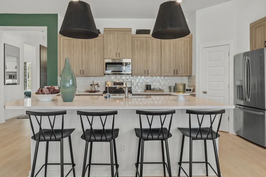 Representative furnished interior of a home built from the Peyton by Chesmar Homes in Crescent Bluff, Georgetown (Image 5).