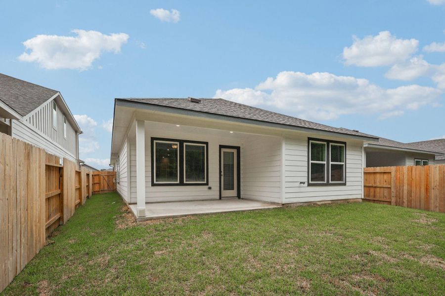 Front exterior of a new home in , New Caney, TX, highlighting curb appeal (Image 14).