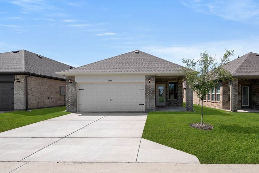 Front exterior of a new home in Redden Farms – Active Adult, Midlothian, TX, highlighting curb appeal (Image 29). Front exterior of a new home in Redden Farms – Active Adult, Midlothian, TX, highlighting curb appeal (Image 29).