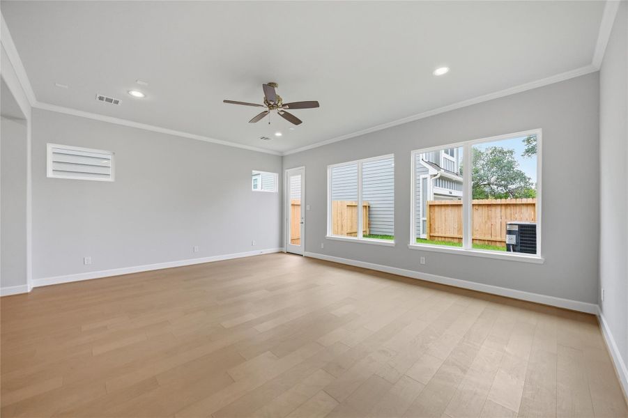 Natural Beauty: Enjoy the tranquility of your backyard views, enhanced by the optimal comfort of a thoughtfully included standard ceiling fan.