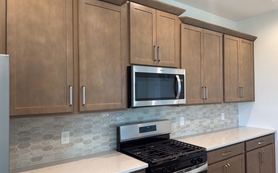 Furnished interior view inside a new home in Eagletail Landings, Howey-in-the-Hills (Image 8).