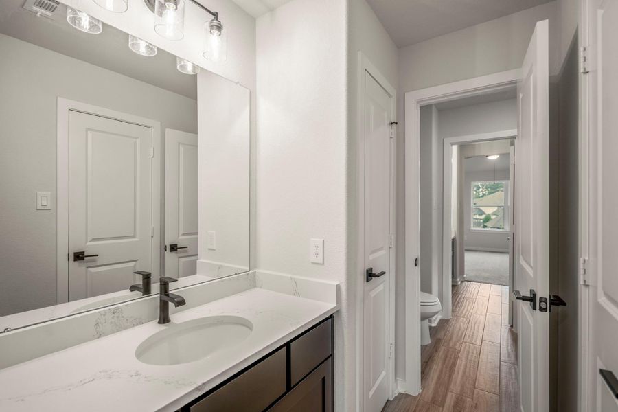 Furnished interior view inside a new home in ARTAVIA 70′ Lots, Conroe (Image 11).