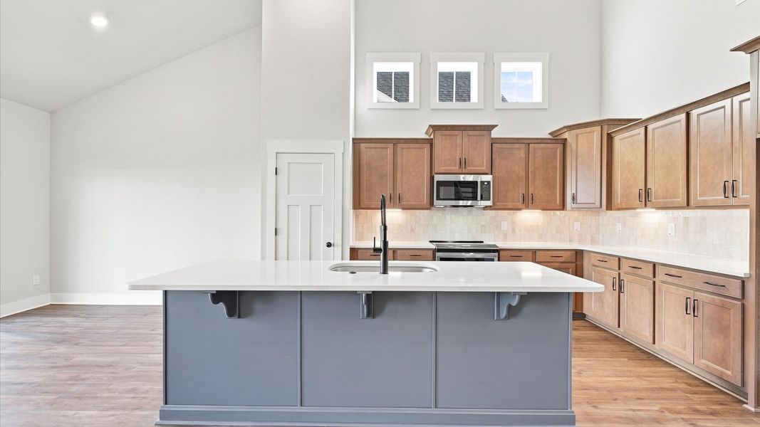 Well-designed kitchen with a center island and tasteful finishes that elevate everyday living located in Inman, SC